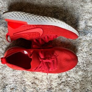 Nike Epic React Flyknit tennis shoes